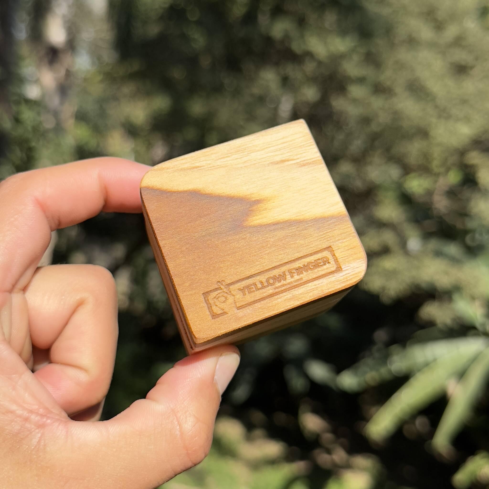 Yellow Finger wooden grinder