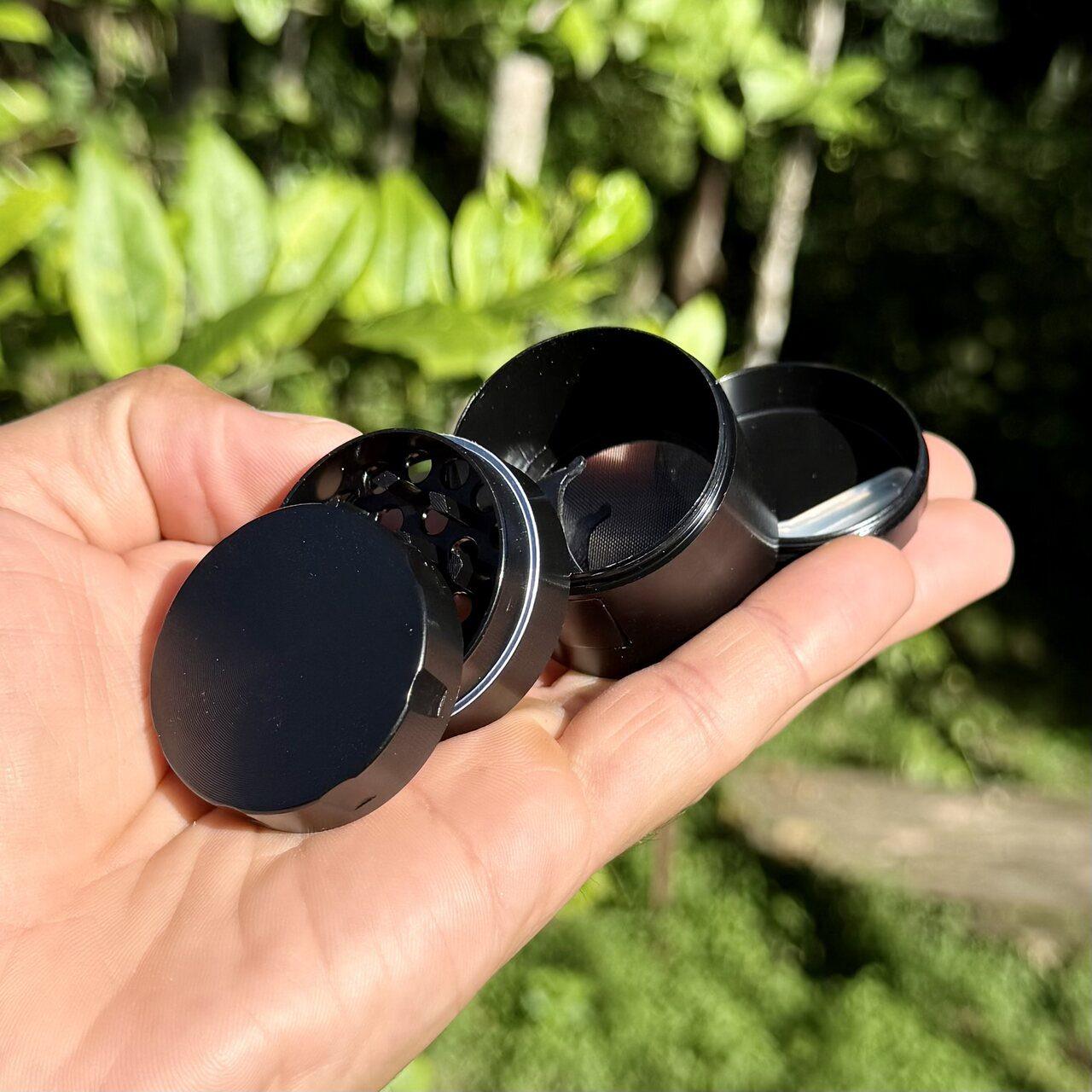 Black grinder with drawer