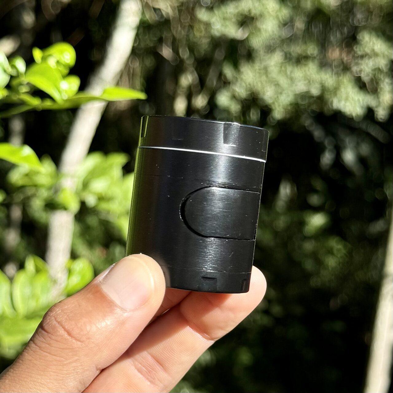 Black grinder with drawer